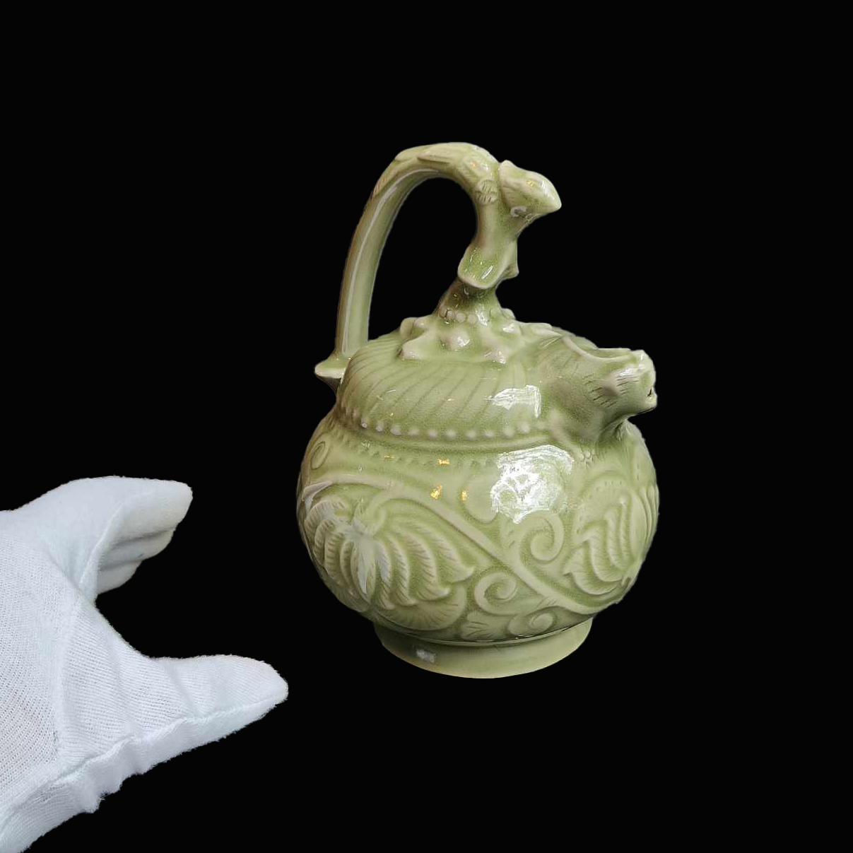 莽葛拾遺-古陶瓷耀州窯青釉纏枝寶相花紋提梁倒流壺品相如圖下拍前請至 